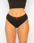 Black underwear with a logo on a white background